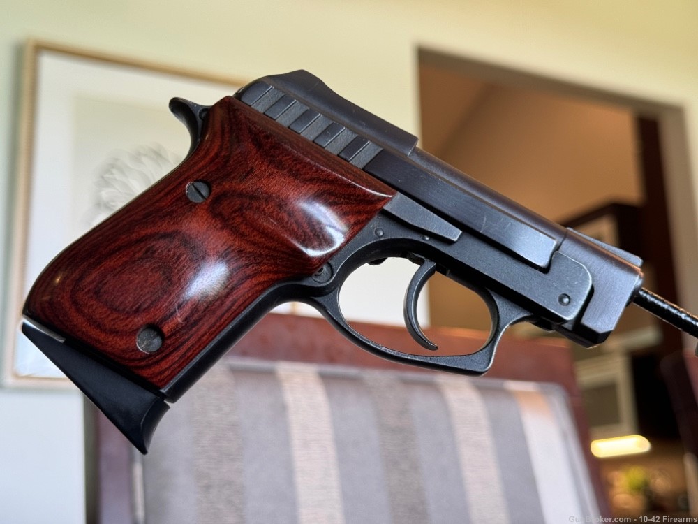 Taurus PT-22 Pistol with Rosewood Grips-img-1