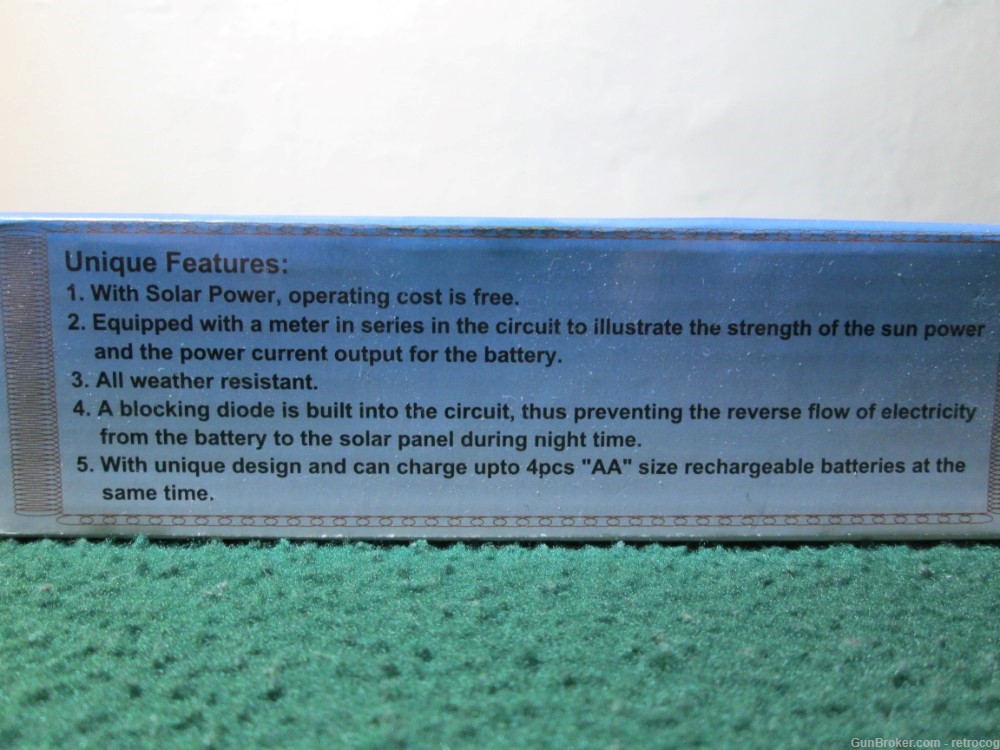 Small Portable Solar Powered Battery Charger for 4x AA Batteries-img-1