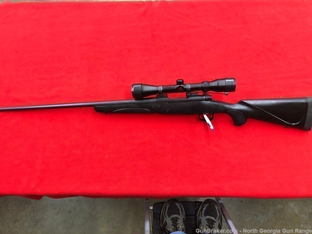 Winchester Model 70 Bolt Action Rifle in .300 WSM with Scope.-img-0