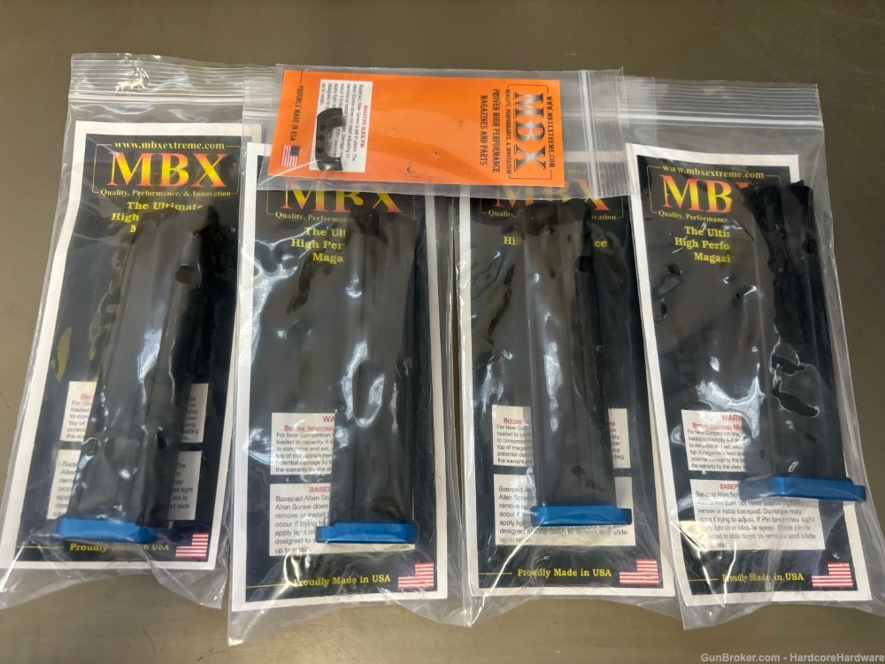 (4) Glock MBX Competition Magazines + MBX mag catch -img-0