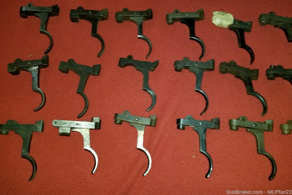 lot of 24 Mauser rifle triggers and sears assorted parts-img-1