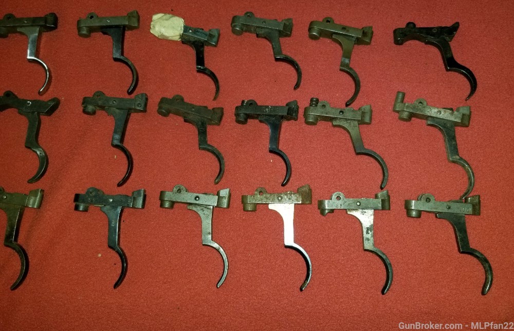 lot of 24 Mauser rifle triggers and sears assorted parts-img-2
