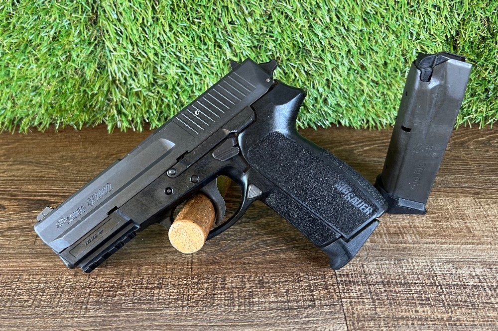 Sig Sauer SP2022 (.40SW) w/ 2 mags Penny Auction -img-0
