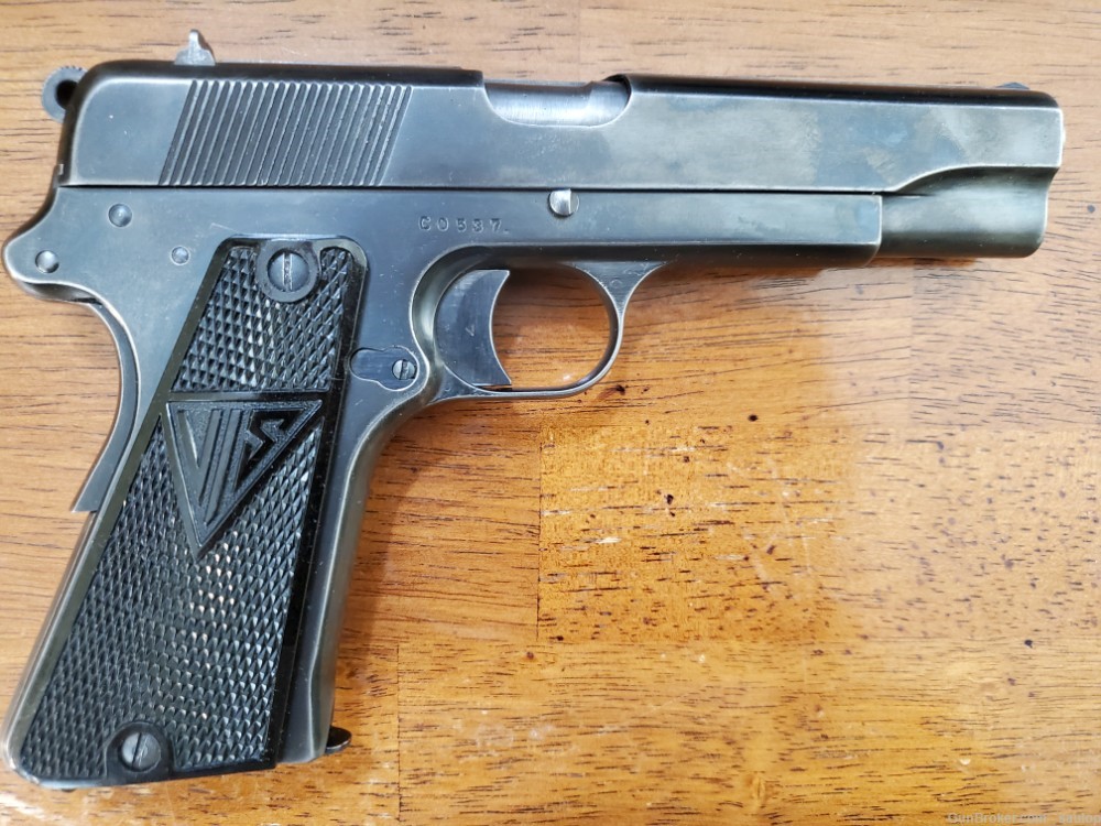 Radom P35 semi-automatic pistol, Serial number CO537. It has a 4 ½” barrel.-img-0