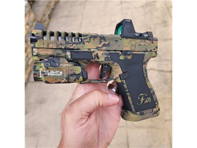 Glock 19 gen 5 modified by Firing Squad Firearms