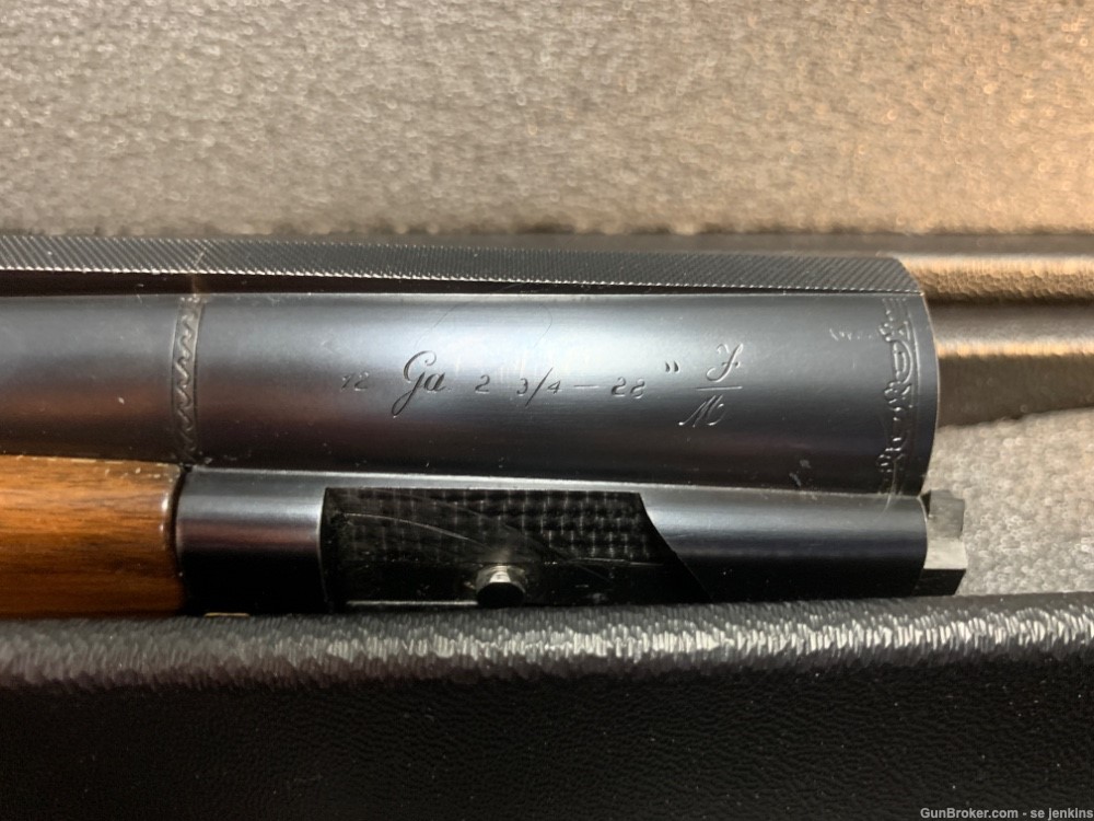 Beretta Gold & Black Over Under 12 Gauge shotgun.-img-36
