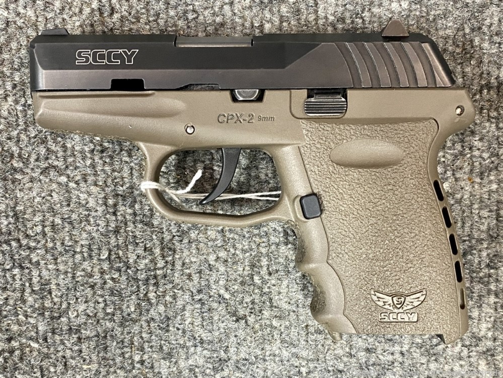 SCCY CPX-2 9mm pistol gently used FDE and Black 1 Mag -img-1