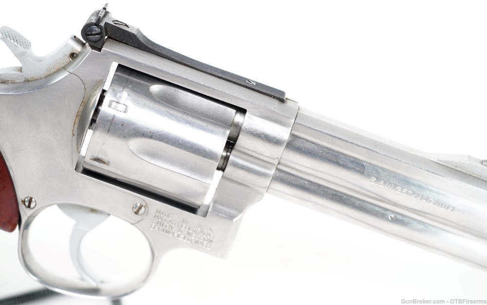 S&W 686 4" .357 mag SS with wood grips-img-11