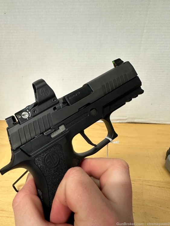 Sig Sauer P320 with Leopold Deltapoint Pro red dot-img-4