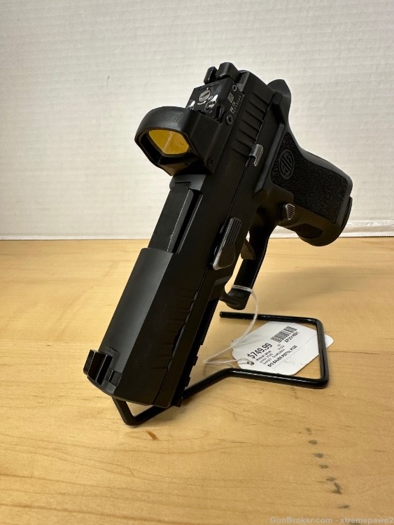 Sig Sauer P320 with Leopold Deltapoint Pro red dot-img-0