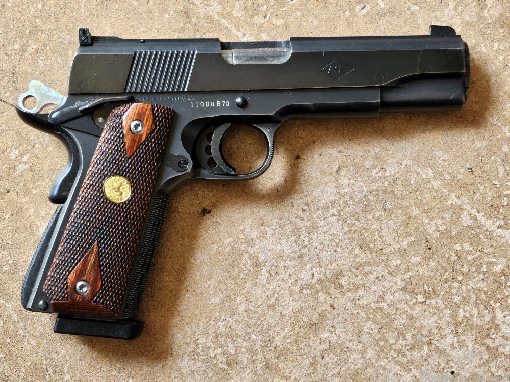 Cleaning up my safe. Had this Colt ACE since the early 80's -img-0