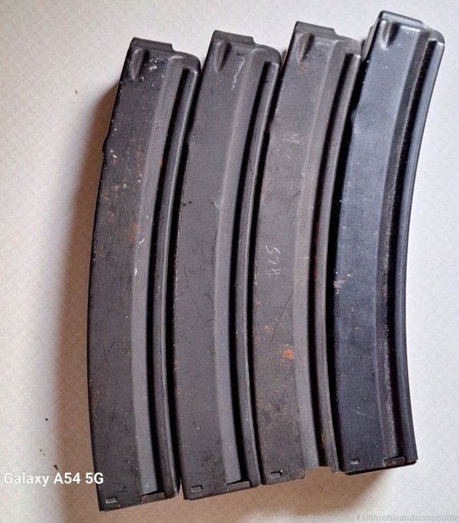 (3) MP5 20 round curved 9mm Mags & (1) body-img-1