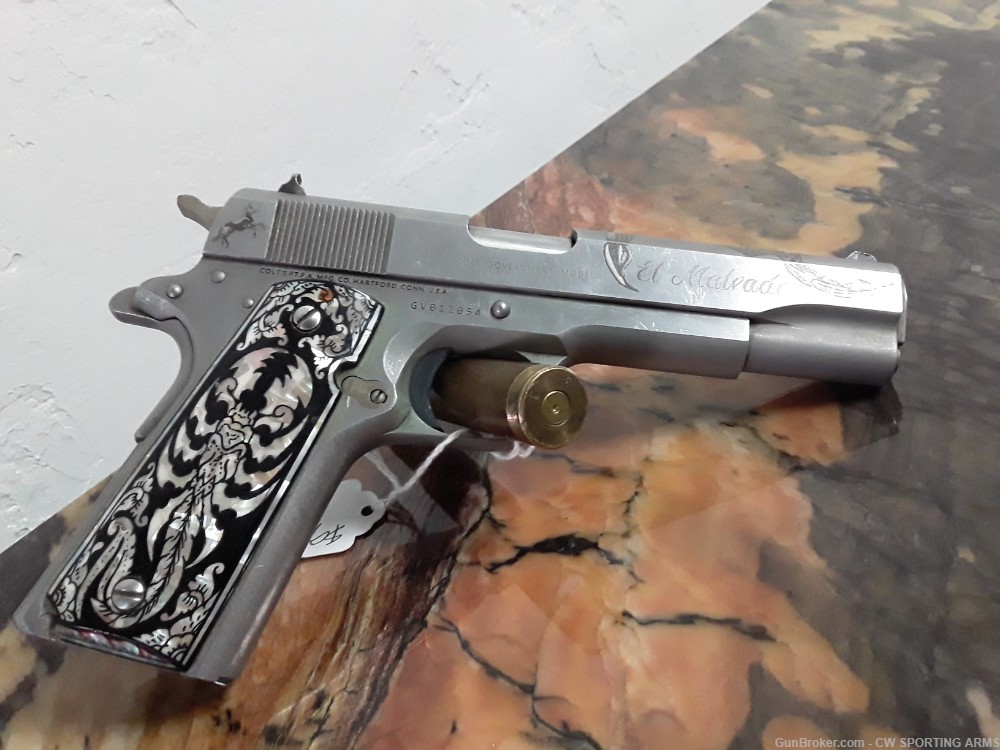 COLT stainless 1911 45 Auto CUSTOM grips and engraving USED GOOD CONDITION.-img-1