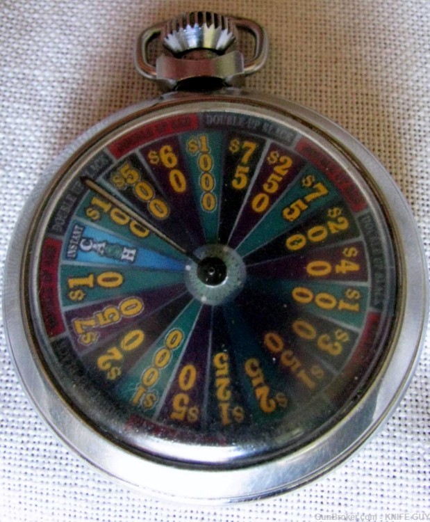 FINE VINTAGE POCKET $10 TO $1,000 DENOMINATION MECHANICAL GAMBLING DEVICE-img-6