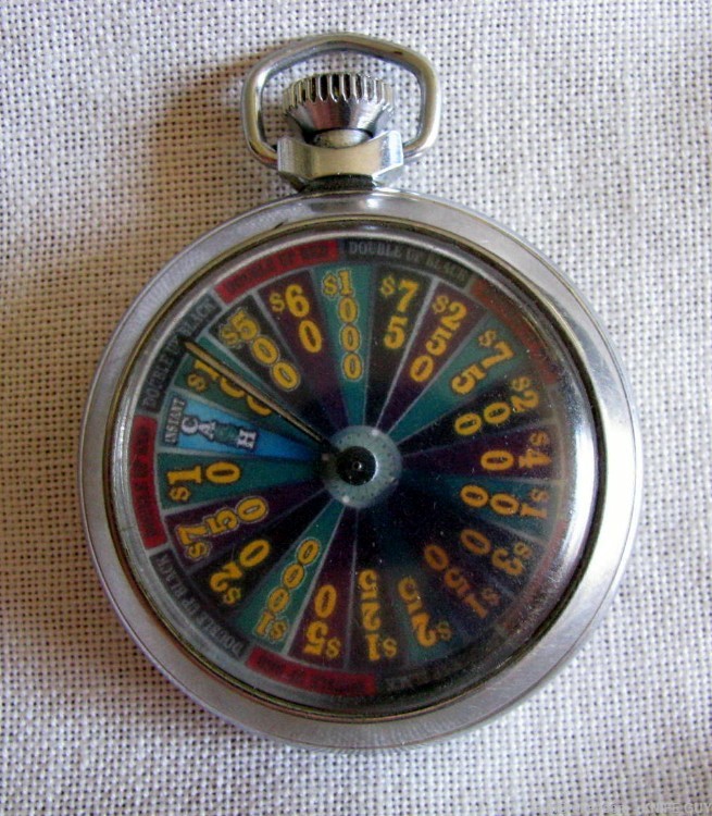 FINE VINTAGE POCKET $10 TO $1,000 DENOMINATION MECHANICAL GAMBLING DEVICE-img-4