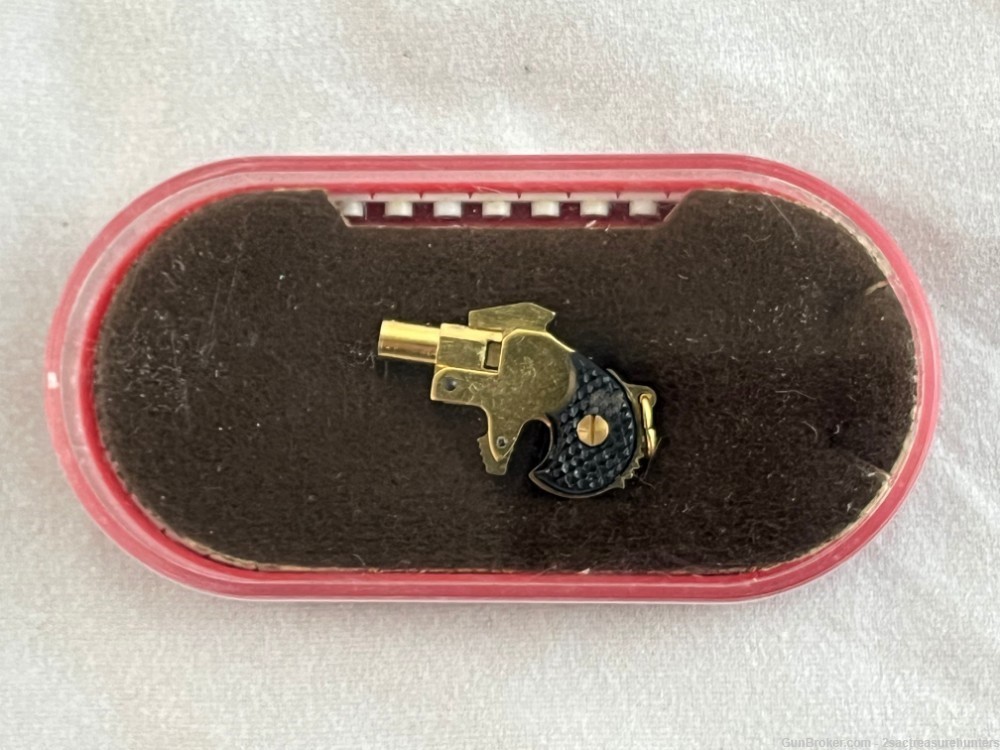 Vintage Andres & Dworsky 700 Series Gold Mini Derringer Cap Gun-img-0