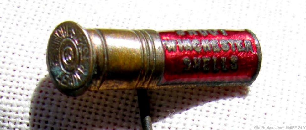 FINE & RARE ANTIQUE WINCHESTER RED ENAMEL FIGURAL 12GAUGE SHOTGUN SHELL PIN-img-0