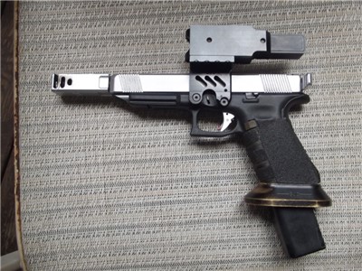 Glock 34 USPSA and SCSA , shoots major power factor 