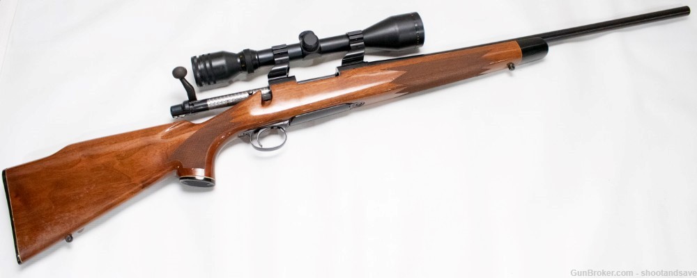 Remington Model 700, .243 Win Bolt-Action Rifle with Scope and Case-img-0