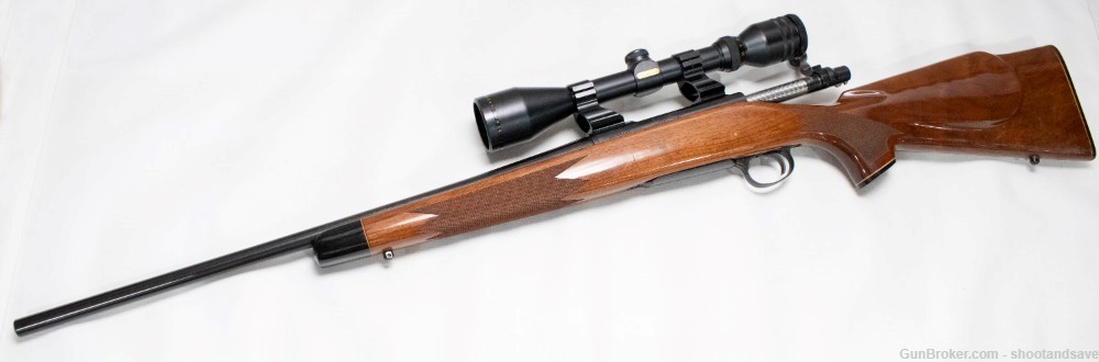 Remington Model 700, .243 Win Bolt-Action Rifle with Scope and Case-img-1