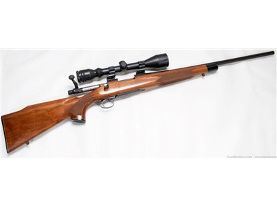 Remington Model 700, .243 Win Bolt-Action Rifle with Scope and Case
