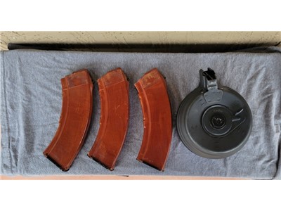 Russian Bakelite magazines (3) and 75 rd Romanian top loader drum (1)