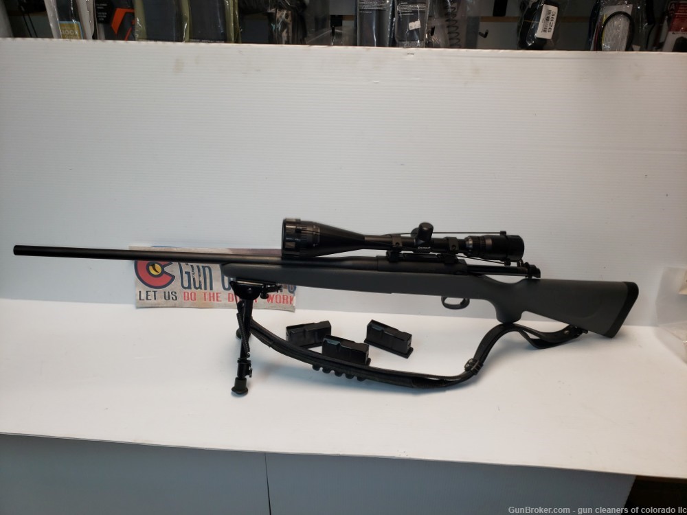 REMINGTON 710 IN .330 WIN MAG WITH SCOPE-img-0