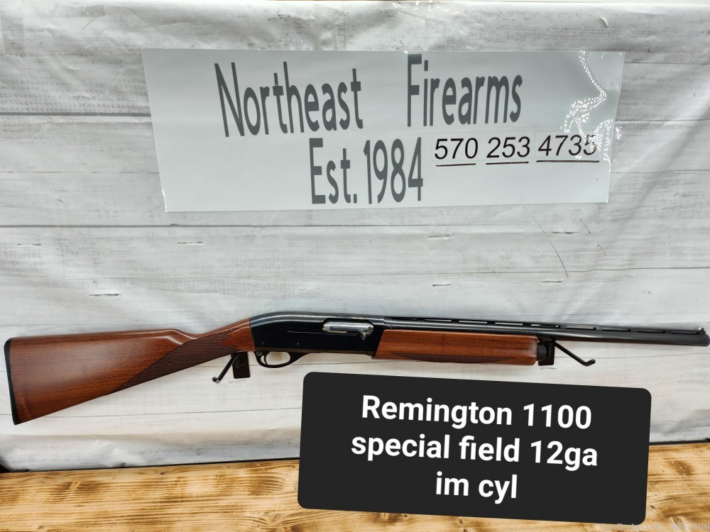 remington 1100 special field 12 ga 21" imp cyl very nice near mint -img-0