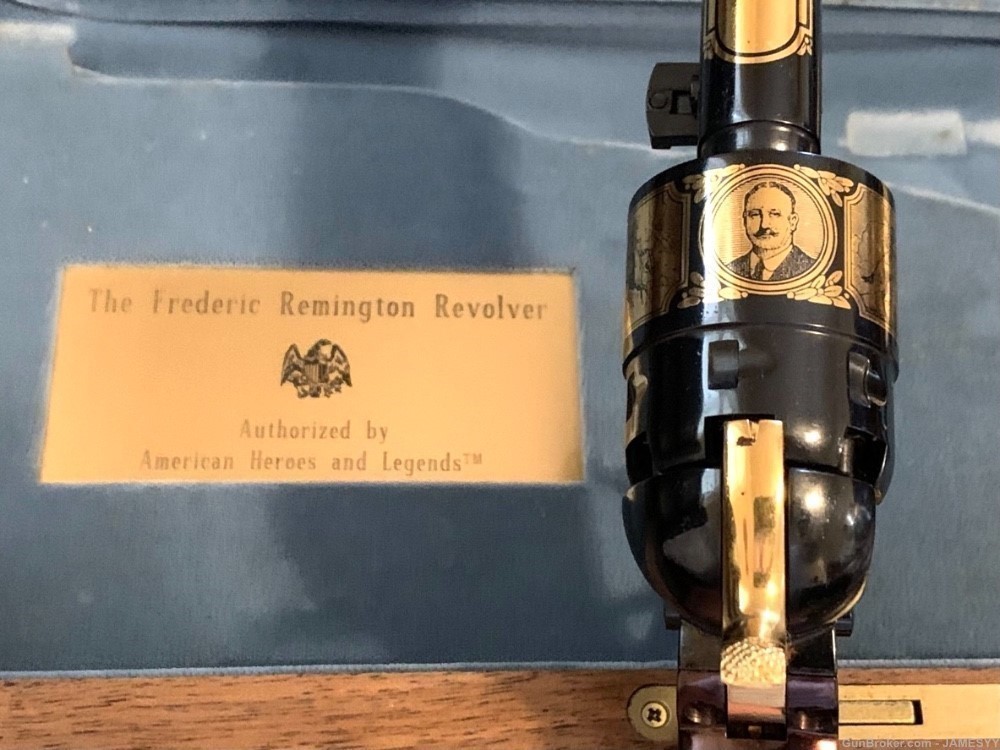 Scarce FREDERIC REMINGTON 24K GOLD REVOLVER.-img-1