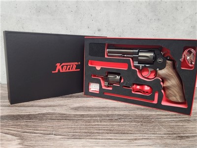 Korth Mongoose .357mag w/ 9mm Cylinder 4" Walnut Grips w/ extra Rubber Grip