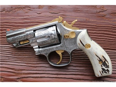 S&W Model 66-3 FULLY ENGRAVED  Polished stainless w/ gold parts stag grips 