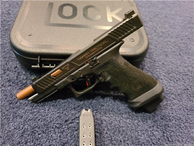 John Wick 2 Glock 34 TTI combat master  Brad 0069 serial number