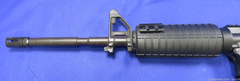 Bushmaster XM15-E2S .223/5.56 16” AR15 Semi-Auto Rifle - MBUS Rear Sight-img-8