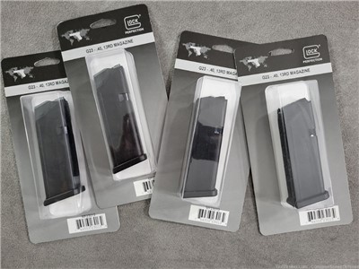 4 EA. NEW FACTORY GLOCK G23 13 ROUND MAGAZINES, PENNY AUCTION!