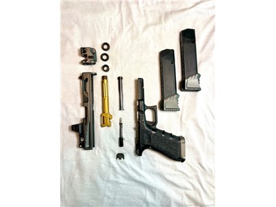 Killer Innovations custom Glock 17 with Comp & Delta Point Pro 