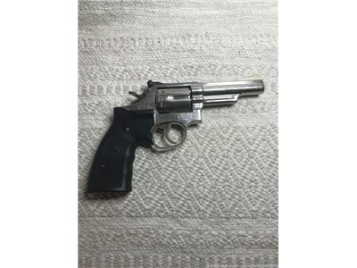 Smith & Wesson Model 19-4 Stainless 357/38 6 Shot Revolver with laser grips