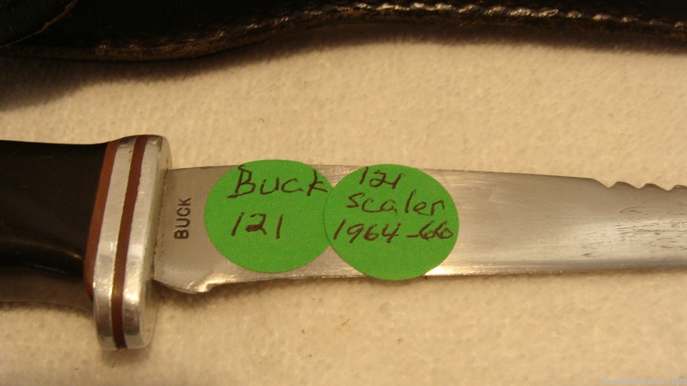 BUCK 121 Scaler with flap over sheath ( mid 1960's )-img-1