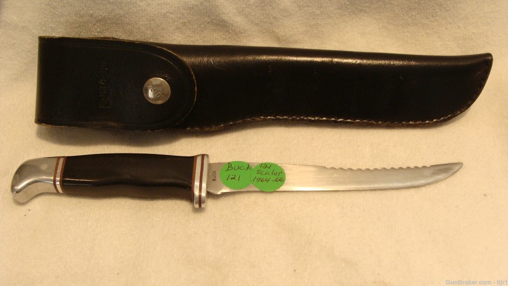 BUCK 121 Scaler with flap over sheath ( mid 1960's )-img-0