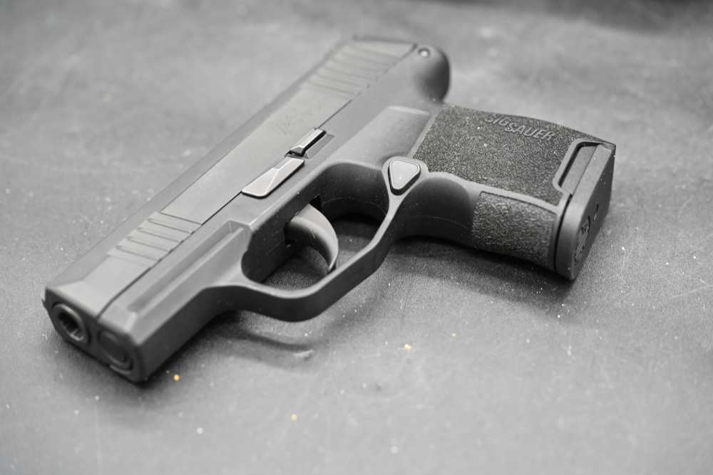 Sig Sauer P365 9mm Micro Compact Pistol w/ 4 Magazines & Case-img-12