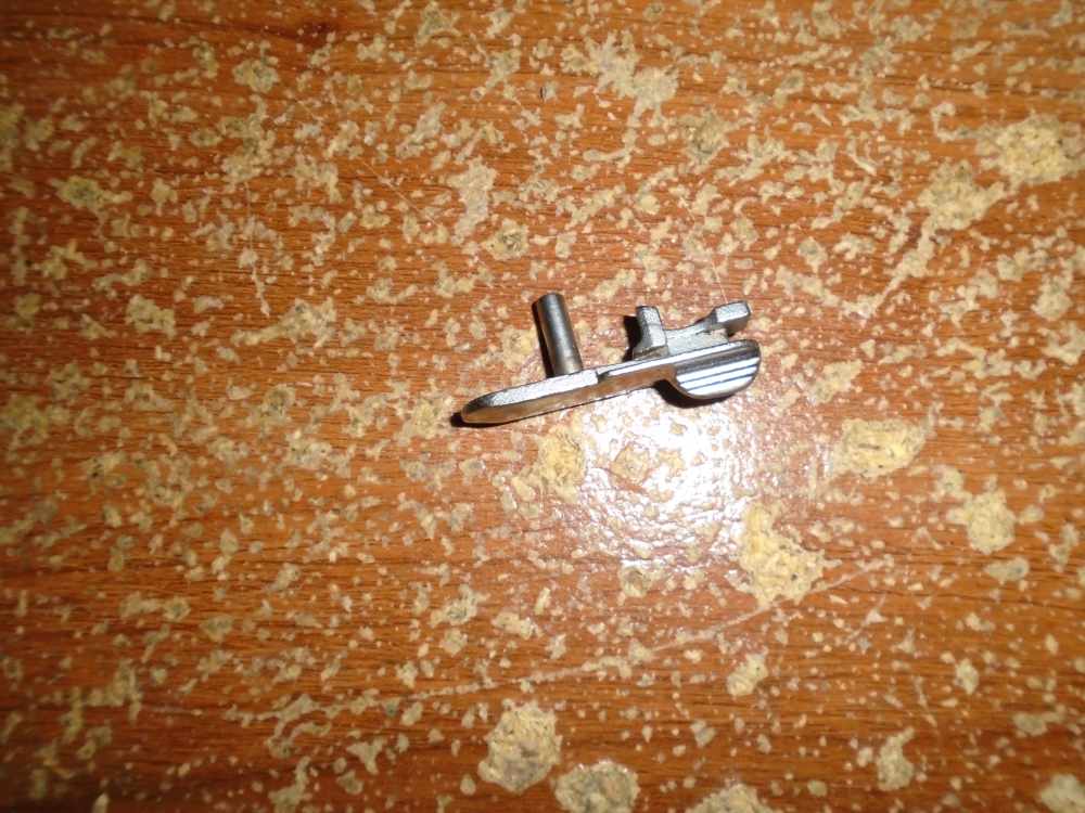 TAURUS MODEL PT-940 .40 S&W SEMI AUTO PISTOL SLIDE CATCH-img-0
