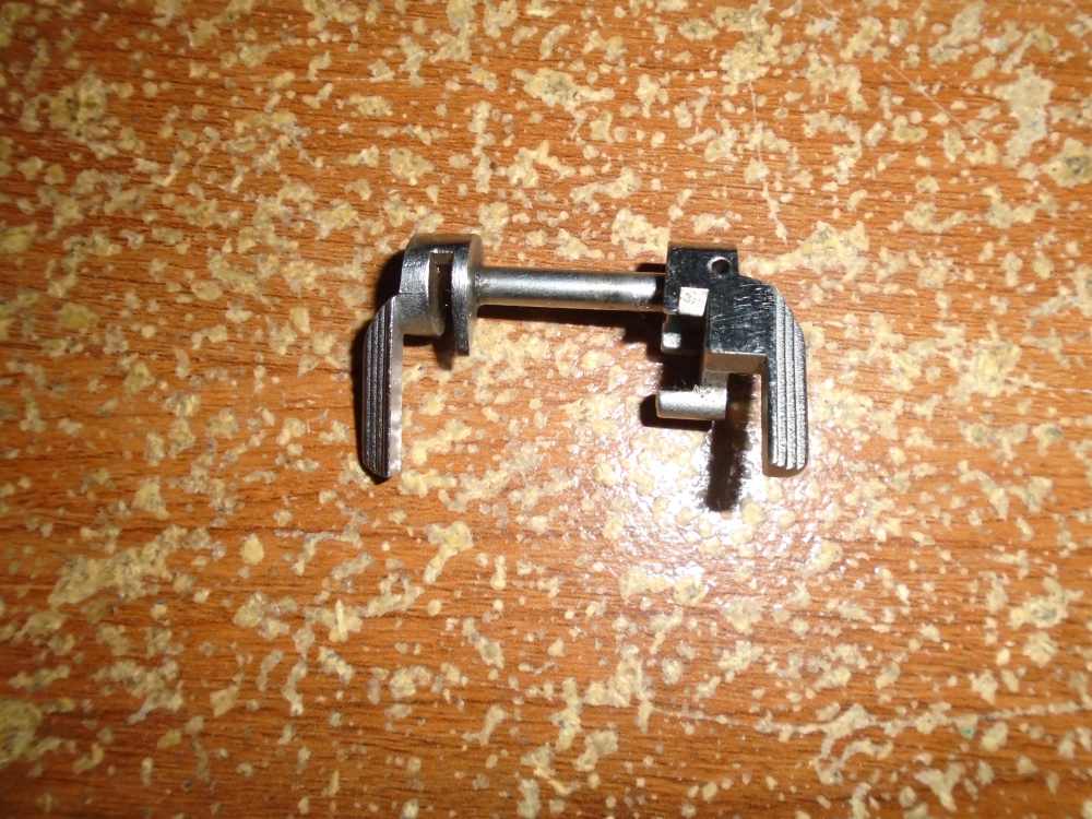 TAURUS MODEL PT-940 .40 S&W SEMI AUTO PISTOL LEFT & RIGHT MAG LATCH-img-0