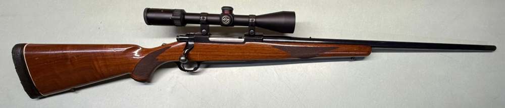 Ruger M77 Tang Safety .338 Win Mag 24.5" Rifle w/ Simmons 4-12x44-img-0