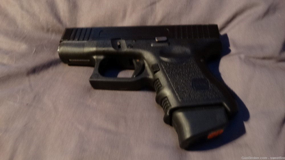 glock g26 gen 3 with aftermarket slide and magazine -img-0