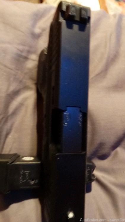 glock g26 gen 3 with aftermarket slide and magazine -img-3