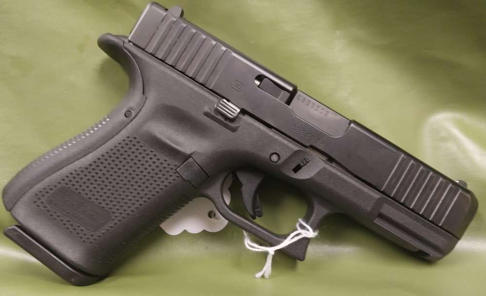 Glock 19 Gen 5, lightly fired, comes w/ box, paperwork, speed loader, and 3-img-2