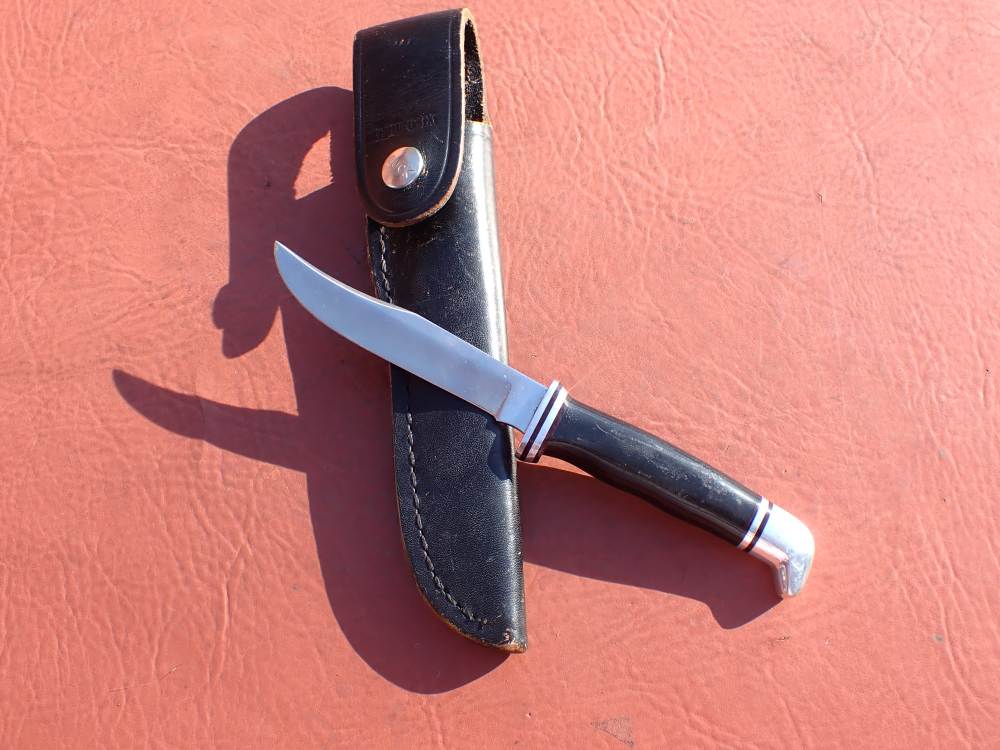 BUCK MODEL 102 WOODSMAN KNIFE WITH BUCK SHEATH MADE FROM 1971-1985-img-49