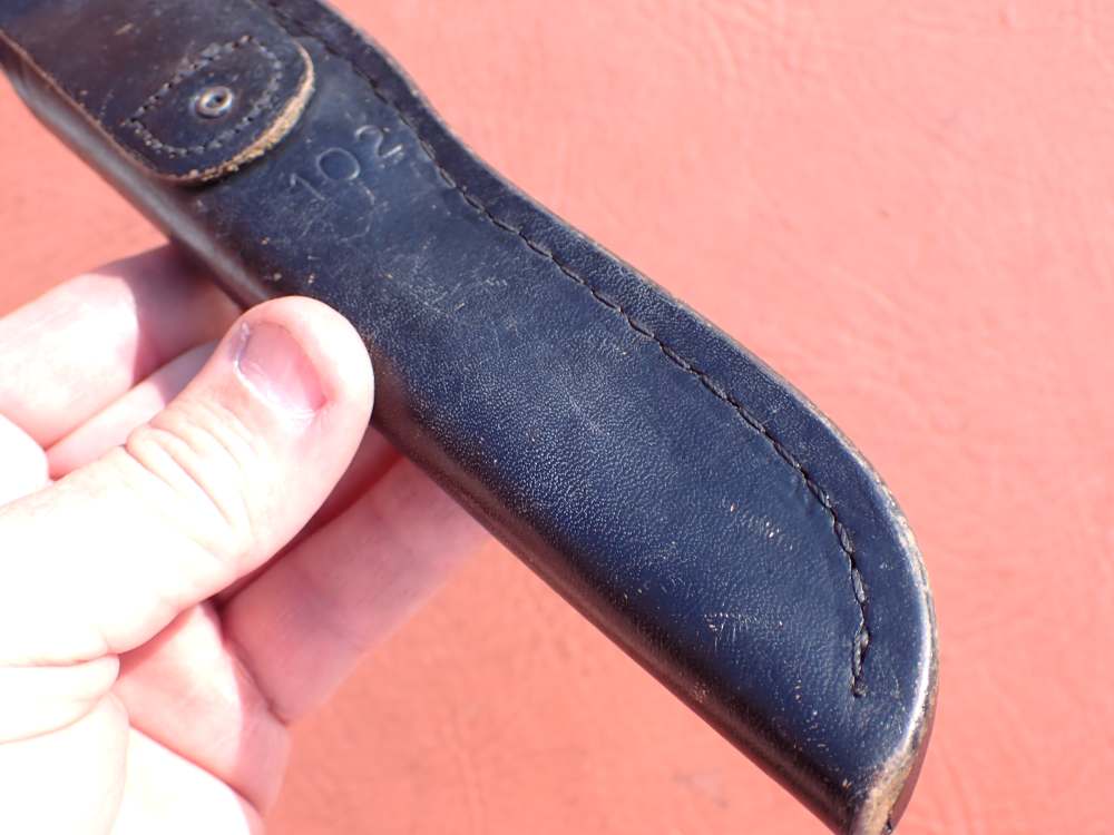 BUCK MODEL 102 WOODSMAN KNIFE WITH BUCK SHEATH MADE FROM 1971-1985-img-46
