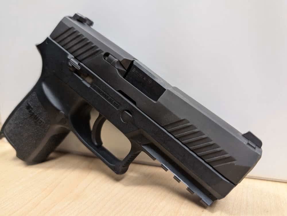 Used Sig Sauer P320 chambered in 9mm Luger (1 Magazine)-img-3