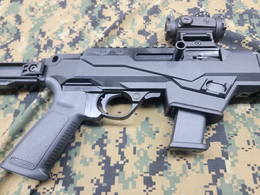Ruger PC Carbine with collapsible stock, glock mag, and accessories.-img-9
