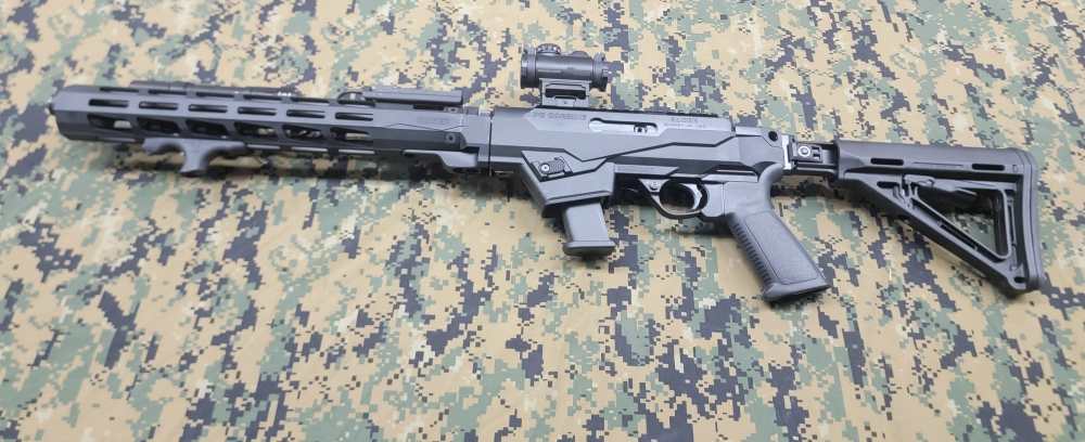 Ruger PC Carbine with collapsible stock, glock mag, and accessories.-img-0